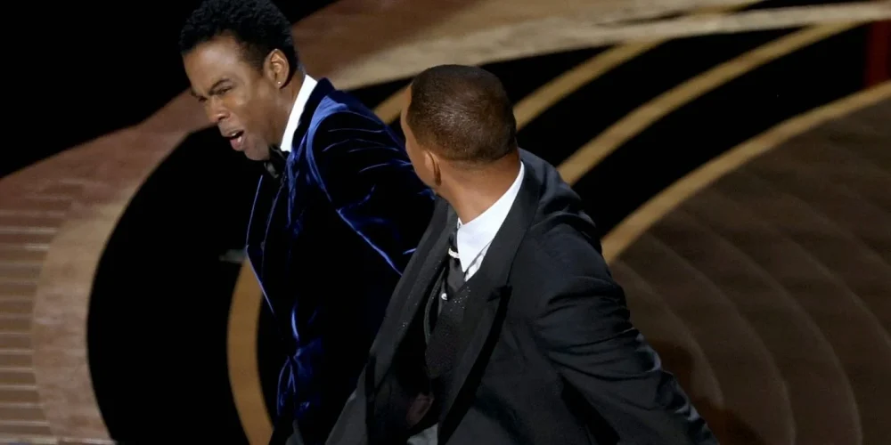 Will Smith punches Chris Rock at the Oscars 2022