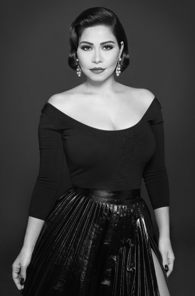 Shirine poses for a promotional portrait following her return with two new singles under Warner Music MENA